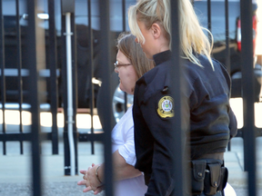 Former nurse Elizabeth Wettlaufer arrives at a Woodstock, Ont., courthouse on Thursday, where she pleaded guilty to eight first-degree murder charges, four attempted murder charges and two aggravated assault charges.