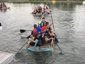 In this image from video, teams compete in the raft race, after qualifications for the Formula 1 Canadian Grand Prix in Montreal, June 10, 2017. Just hours before strapping rock star drivers into multimillion-dollar cars traveling at more than 200 mph, team crews--and executives--traded their firesuits for life preservers in a beer-soaked beach party on the erstwhile Olympic rowing venue next to the Circuit Giles Villeneuve. (AP Photo/Jimmy Golen)