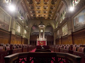The Senate chamber sits empty on September 12, 2014 in Ottawa.