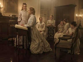 This image released by Focus Features shows, from left, Elle Fanning, Nicole Kidman, Kirsten Dunst, Angourie Rice, Oona Laurence, Emma Howard and Addison Riecke in a scene from "The Beguiled." (Ben Rothstein/Focus Features via AP)