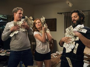 This image released by Warner Bros Pictures shows, from left, Will Ferrell, Amy Poehler and Jason Mantzoukas in a scene from "The House." (Glen Wilson/Warner Bros. Entertainment via AP)