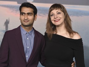 FILE - In this March 8, 2017 file photo, Kumail Nanjiani, left, and his wife Emily Gordon arrive at the Los Angeles premiere of "Kong: Skull Island." Nanjiani and Gordon wrote the film, "The Big Sick," which chronicles their relationship from the start, when the Pakistan-born Nanjiani was trying to make it as a stand-up in Chicago. (Photo by Jordan Strauss/Invision/AP, File)