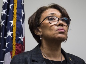 FILE - In this June 20, 2017, file photo, Flint, Mich. Mayor Karen Weaver listens to a question during a closed news conference discussing the water source recommendation made for Flint at City Hall. The state of Michigan sued Flint on Wednesday, June 28, 2017, alleging that the city council's refusal to approve a broadly backed deal to buy water long term from a Detroit-area system is endangering public health in the wake of a man-made crisis that left the supply contaminated with lead. The Department of Environmental Quality had threatened legal action if the council did not approve Weaver's recommendation or propose a reasonable alternative by Monday.(Shannon Millard/The Flint Journal-MLive.com via AP, File)