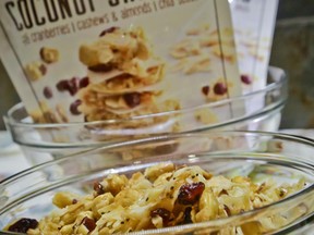 Creative Coconut Snacks is unveiled at a press preview as the 2017 Sofi specialty foods new product winner in the snacks category, Thursday, June 22, 2017, in New York. The product is among thousands of food and beverage items from more than 2,600 food artisans, importers and entrepreneurs from the around the globe at the annual Summer Fancy Food Show at the Javits Center. (AP Photo/Bebeto Matthews)