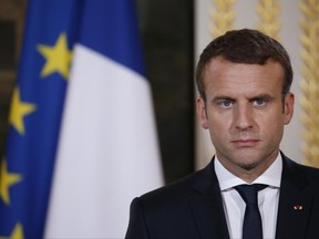 France's President Emmanuel Macron attends a joint news conference following a meeting with Jordan's King Abdullah II, at the Elysee Palace, in Paris, Monday, June 19, 2017. (Gonzalo Fuentes, Pool Photo via AP)