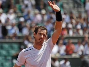 Andy Murray celebrates winning his fourth-round match against Karen Khachanov at the French Open on June 5.