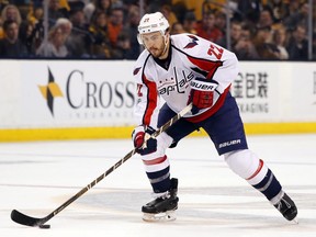 FILE - In this April 8, 2017, file photo, Washington Capitals defenseman Kevin Shattenkirk works with the puck during the team's NHL hockey game against the Boston Bruins in Boston. Shattenkirk at 28 is looking at a long-term, lucrative deal after leading all pending unrestricted free agents with 56 points last season. (AP Photo/Winslow Townson, File)