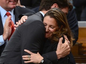 Minister of Foreign Affairs Chrystia Freeland is congratulated by Prime Minister Justin Trudeau and party members after delivering a speech in the House of Commons on Canada's Foreign Policy in Ottawa on Tuesday, June 6, 2017.