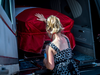 Hayden, places a hand on the casket of her uncle Nazzareno Tassone before the start of his funeral procession from Toronto to his hometown of Niagara Falls, Ont., June 21, 2017.