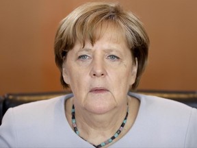 German Chancellor Angela Merkel, looks on as she arrives for the weekly cabinet meeting at the Chancellery in Berlin, Germany, Wednesday, June 28, 2017. (AP Photo/Michael Sohn)