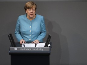 German Chancellor Angela Merkel delivers her speech about last week's EU Summit and the upcoming G-20 Summit at the German parliament Bundestag in Berlin Thursday, June 29, 2017. (AP Photo/Markus Schreiber)