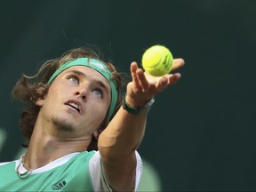 Germany's Alexander Zverev prepares to serve to Spain's Roberto Bautista Agut in the quarterfinal of the ATP tournament in Halle, Germany, Friday, June 23, 2017. (Friso Gentsch/dpa via AP)