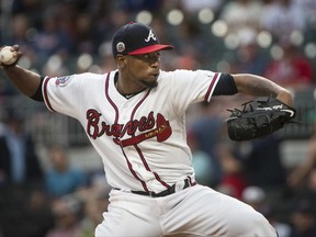 Atlanta Braves' Julio Teheran pitches against the San Francisco Giants during the first inning of a baseball game, Tuesday, June 20, 2017, in Atlanta. (AP Photo/John Amis)