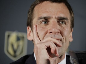 Vegas Golden Knights general manager George McPhee listens during a news conference in Las Vegas on April 13.