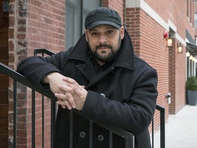 In this Jan. 9, 2017, photo, Christian Picciolini, founder of the group Life After Hate, a domestic program dedicated to helping people leave white power groups including neo-Nazi organizations and the Ku Klux Klan, poses for a photo outside his Chicago home. The Trump administration is eliminating funding for the U.S. nonprofit that combats white extremism.  (AP Photo/Teresa Crawford, File)
