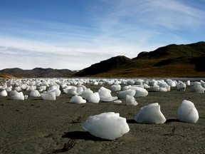 Ice boulders left behind after a flood caused by the overflowing of a lake, east to the town of Kangerlussuaq in 2007, similar to yesterday's earthquake, leading to a landslide, causing a tsunami and flood