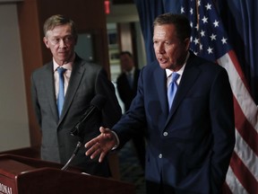 Ohio Gov. John Kasich, right, joined by Colorado Gov. John Hickenlooper, speaks during a news conference at the National Press Club in Washington, Tuesday, June 27, 2017, about Republican legislation overhauling the Obama health care law. (AP Photo/Carolyn Kaster)