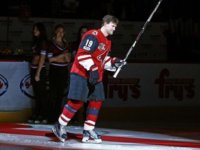 Arizona Coyotes right wing Shane Doan acknowledges the home crowd during a ceremony honouring him for his 400th NHL goal and his 1,500th NHL game on Jan. 7.