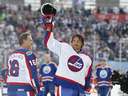Teemu Selanne salutes the crowd at the NHL Heritage Classic alumni game in Winnipeg on Oct. 22, 2016.