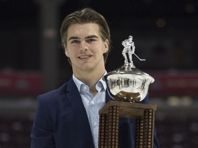 Canadian Hockey League rookie of the year Nico Hischier, from the Halifax Mooseheads, holds his trophy following a media availability at the Memorial Cup.