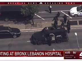 In this image taken from video provided by WNBC 4 New York, emergency personnel converge on Bronx Lebanon Hospital in New York, after a gunman opened fire there on Friday, June 30, 2017. (NBC 4 New York via AP)