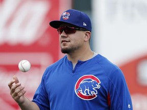 Iowa Cubs outfielder Kyle Schwarber warms up before a Triple-A baseball game against the New Orleans Baby Cakes, Monday, June 26, 2017, in Des Moines, Iowa. (AP Photo/Charlie Neibergall)