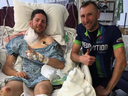 James Frederick (L) and his friend Alex Ippoliti (R)sit in the hospital where James is recovering from the bear attack.