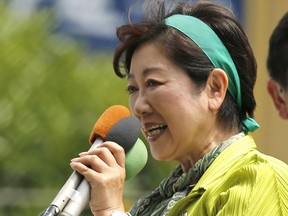 In this Thursday, June 29, 2017 photo, Tokyo Gov. Yuriko Koike addresses a crowd during her "Tomin (Tokyoites) First" party's campaign rally for Tokyo Metropolitan Assembly election in Tokyo. The election for Tokyo metropolitan assembly on Sunday, July 2 is attracting more attention than usual, because it could shift the political landscape in Japan. A big win for the new political party created by populist Koike could strengthen her base and foreshadow an eventual run for prime minister. (AP Photo/Shuji Kajiyama)
