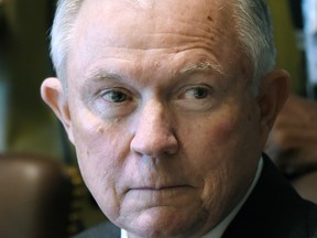 U.S. Attorney General Jeff Sessions looks on during a meeting with U.S. President Donald Trump in the Cabinet Room of the White House June 12, 2017.