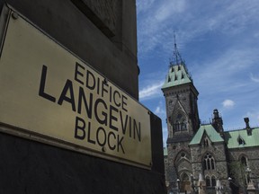 A sign sits outside a door on Langevin Block near Parliament Hill in Ottawa, Wednesday June 21, 2017.