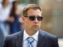 Toronto Police officer Leslie Nyznik outside court on May 29, 2017. Nyznik, and two other officers are accused in the sexual assault of a female colleague from the parking unit.