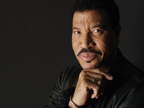 In this June 7, 2017 photo, singer-songwriter Lionel Richie poses for a portrait in Burbank, Calif., to promote his concert tour. (Photo by Chris Pizzello/Invision/AP)