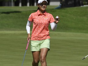 Ai Miyazato, of Japan, waves to fans after sinking her putt on the 10th hole during the LPGA Wal-Mart NW Arkansas Championship golf tournament at Pinnacle Country Club in Rogers, Ark., Sunday, June 25, 2017. (AP Photo/Michael Woods)