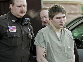 FILE - In this March 3, 2006, file photo, Brendan Dassey, is escorted out of a Manitowoc County Circuit courtroom in Manitowoc, Wis. Wisconsin attorneys asked a federal appeals court Monday, June 26, 2017, to keep Dassey, an inmate featured in the Netxflix series "Making a Murderer," behind bars while they fight a second ruling overturning his conviction. (AP Photo/Morry Gash, File)