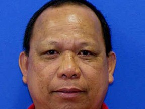 FILE - This photo provided by the Maryland Motor Vehicle Administration shows Eulalio Tordil. Former federal officer Tordil pleaded guilty on Monday, June 26, 2017, to killing his wife Gladys Tordil on May 5, 2016, in the parking lot of a high school in Beltsville where she was picking up her daughters. (Maryland Motor Vehicle Administration via AP, File)
