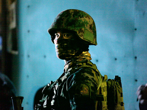 Filipino soldiers take their position outside Resorts World Manila after gunshots and explosions were heard in Pasay City on June 2, 2017 in Manila, Philippines.