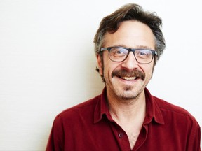 FILE - In this April 11, 2013, file photo, comedian Marc Maron poses in New York. Maron was ready for a new challenge: playing someone other than himself. In the new Netflix comedy "GLOW," he stars as the producer of a ladies pro-wrestling cable show.  (Photo by Dan Hallman/Invision/AP, File)