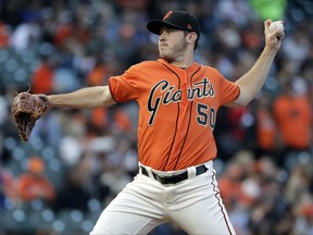 San Francisco Giants starting pitcher Ty Blach throws to the New York Mets during the first inning of a baseball game Friday, June 23, 2017, in San Francisco. (AP Photo/Marcio Jose Sanchez)