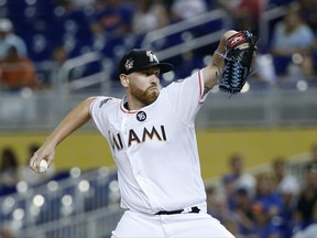Miami Marlins' Dan Straily delivers a pitch during the first inning of a baseball game against the New York Mets, Tuesday, June 27, 2017, in Miami. (AP Photo/Wilfredo Lee)