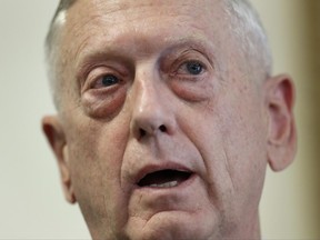 In this June 28, 2017, photo, U.S. Secretary of Defense Jim Mattis speaks in Garmisch-Partenkirchen, Germany. Mattis is giving the military chiefs another six months before they begin allowing transgender individuals to enlist in the armed services. Pentagon spokeswoman Dana White says he made the decision June 30. A Mattis memo obtained by The Associated Press says he wanted to give the services time to insure the change won't affect the readiness and lethality of the force. (AP Photo/Matthias Schrader)