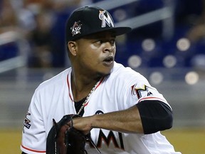 Miami Marlins' Edinson Volquez delivers a pitch during the first inning of a baseball game against the Washington Nationals, Tuesday, June 20, 2017, in Miami. (AP Photo/Wilfredo Lee)