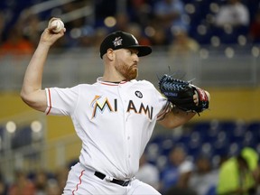 Miami Marlins' Dan Straily delivers a pitch during the first inning of a baseball game against the Washington Nationals, Wednesday, June 21, 2017, in Miami. (AP Photo/Wilfredo Lee)