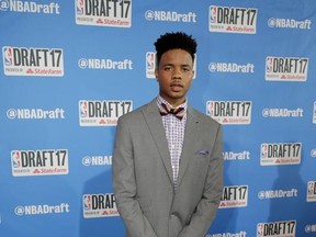 Washington's Markelle Fultz poses for photos on the red carpet before the start of the NBA basketball draft, Thursday, June 22, 2017, in New York. (AP Photo/Frank Franklin II)