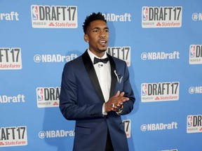 Kentucky's Malik Monk stops for photos while walking the red carpet before the start of the NBA basketball draft, Thursday, June 22, 2017, in New York. (AP Photo/Frank Franklin II)