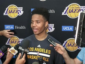 FILE - In this June 15, 2017, file photo, Markelle Fultz speaks with reporters after his private workout with the Los Angeles Lakers in El Segundo, Calif. Fultz is expected to be a top pick at the NBA Draft on Thursday, June 22. (AP Photo/Greg Beacham, FIle)