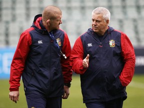 British and Irish Lions head coach Warren Gatland, right, talks with his assistant Graham Rowntree during a training session in Auckland, New Zealand, Thursday, June 22, 2017. The Lions and the All Blacks play the first in three tests at Eden Park on Saturday June 24.(AP Photo/Mark Baker)