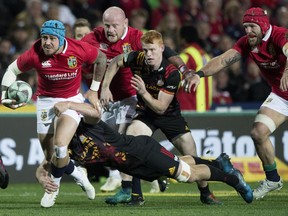 British & Irish Lions winger Jack Nowell, left, makes a break during their game against the Chiefs at Waikato Stadium in Hamilton, New Zealand, Tuesday, June 20, 2017. (Brett Phibbs/New Zealand Herald via AP)