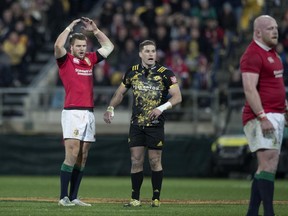 British and Irish Lions flyhalf Dan Biggar reacts after his attempt at a drop goal missed against the Hurricanes in Wellington, New Zealand, Tuesday, June 27, 2017. (Brett Phibbs/New Zealand Herald via AP)