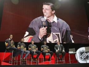 Vegas Golden Knights goaltender Marc-Andre Fleury, Deryk Engelland, Brayden McNabb and Jason Garrison sit on stage during an event following the NHL expansion draft, Wednesday in Las Vegas. Fleury was picked off the roster of the Pittsburgh Penguins.