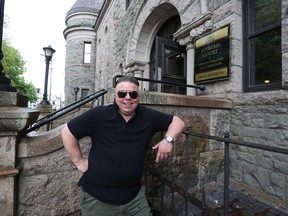 Gemma Hickey stands on the steps of the Supreme Court in St. John's NL on Friday on June 23 2017. Hickey a transgender activist vying for a non-binary birth certificate is taking legal action against the Newfoundland and Labrador government as part of a crusade to have genders other than male and female formally recognized. THE CANADIAN PRESS/Paul Daly